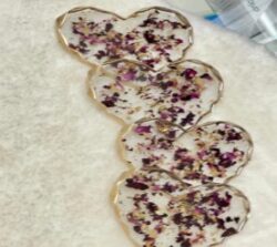 Heart shaped resin coasters with dry rose petals inside