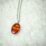 Oval shape Resin  Earing in Silver Bezel with white dry flower